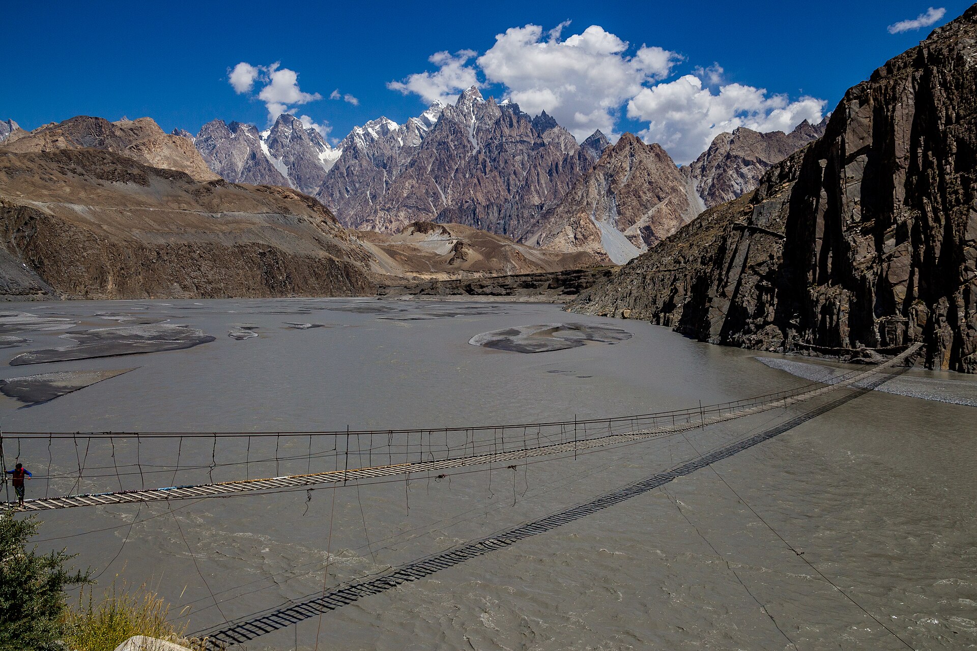Cross the Hussaini suspension bridge
